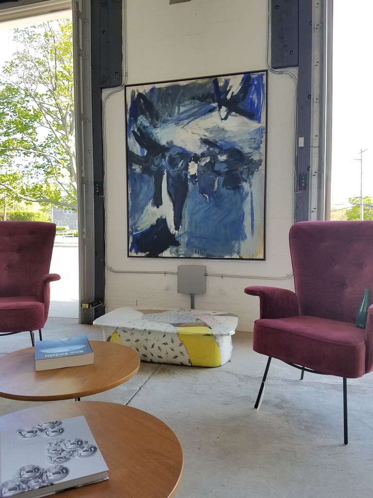 Painting by Georg Baselitz. Glazed ceramic table by Hun Chung Lee. Painting by Georg Baselitz. Glazed ceramic table by Hun Chung Lee.
