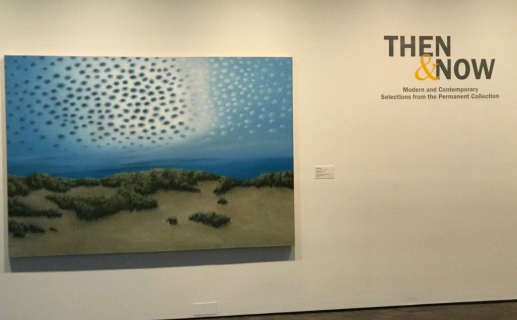 At the entrance to Then & Now, April Gornick, April 20, 1953, Cleveland, OH, Changing Sky, 1980, oil on canvas, 65 5/8 x 96 1/4 inches, unsigned, Collection Neuberger Museum of Art, Purchase College, State University of New York, Gift of Roy R. Neuberger At the entrance to Then & Now, April Gornick, April 20, 1953, Cleveland, OH, Changing Sky, 1980, oil on canvas, 65 5/8 x 96 1/4 inches, unsigned, Collection Neuberger Museum of Art, Purchase College, State University of New York, Gift of Roy R. Neuberger