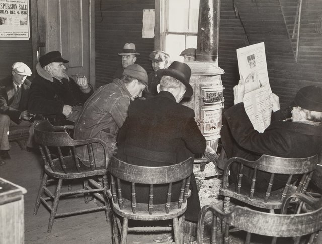 Russell Lee, ‘Farmers Sitting Around the Stove Enjoying Themselves and Getting Warm, Weighing-in Room of the Stockyards, Aledo, Illinois’, 1936, Photography, Gelatin silver, printed later, Heritage Auctions