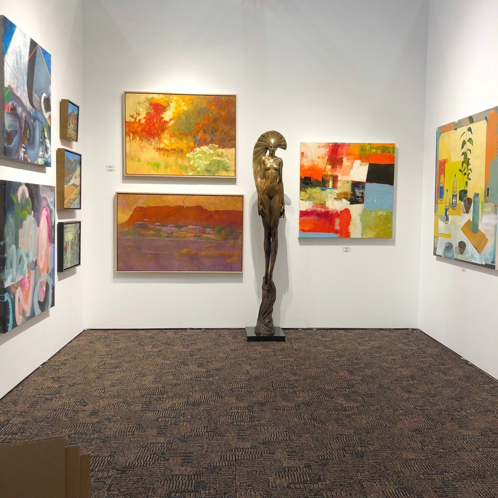 "Sun Goddess", Kraig Varner, watches over the desert hues of Andy Taylors "Pico" and "Posterior" and Brent Godfrey's "Untitled Desert" "Sun Goddess", Kraig Varner, watches over the desert hues of Andy Taylors "Pico" and "Posterior" and Brent Godfrey's "Untitled Desert"