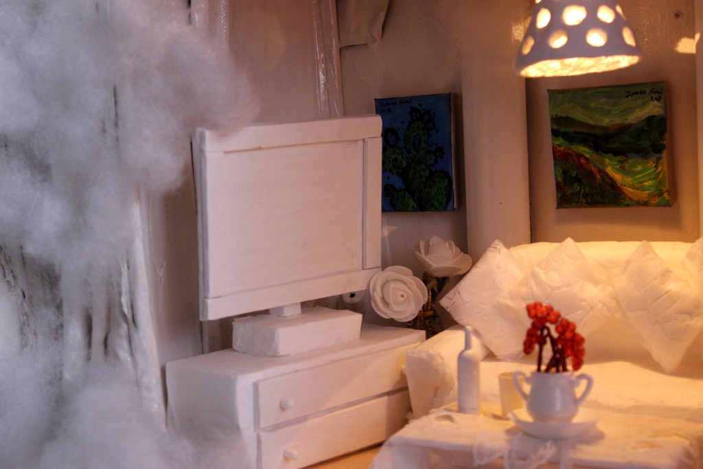 Cloudy Accommodation: In this work, the artist reflects her thoughts of what we carry with us when we leave our original homeland whether the reason of leaving is compulsory or optional. She questions what are the important things that we carry in our suitcase: Is it only our memories? Or our physical and moral world in which we lived in? Or is it the dream that we seek for? (Detail Image) Cloudy Accommodation: In this work, the artist reflects her thoughts of what we carry with us when we leave our original homeland whether the reason of leaving is compulsory or optional. She questions what are the important things that we carry in our suitcase: Is it only our memories? Or our physical and moral world in which we lived in? Or is it the dream that we seek for? (Detail Image)