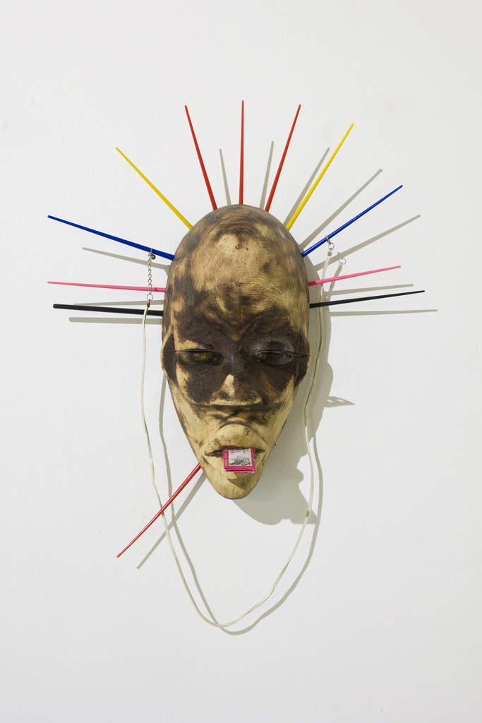 Pascale Marthine Tayou, Masque délavé, 2015. Wood, mixed media. Image courtesy of the artist and GALLERIA CONTINUA. Photo by Rémi Lavalle. Pascale Marthine Tayou, Masque délavé, 2015. Wood, mixed media. Image courtesy of the artist and GALLERIA CONTINUA. Photo by Rémi Lavalle.