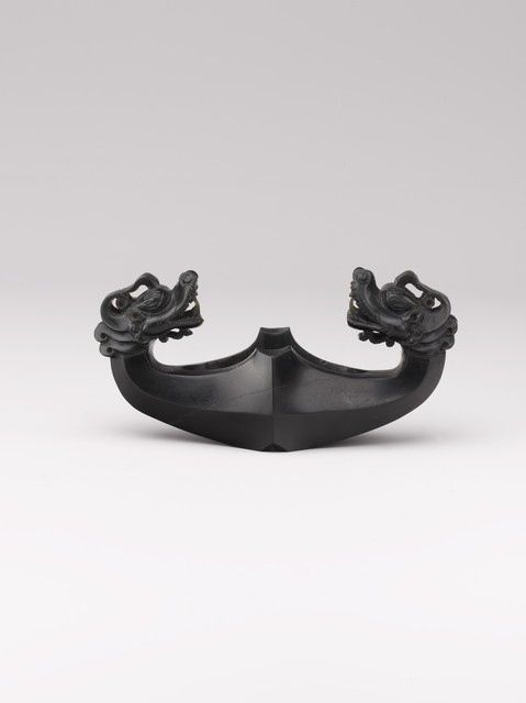 Unknown Timurid, ‘Sword Guard in the Form of Confronted Dragons’, 14th–early 15th century, The Metropolitan Museum of Art
