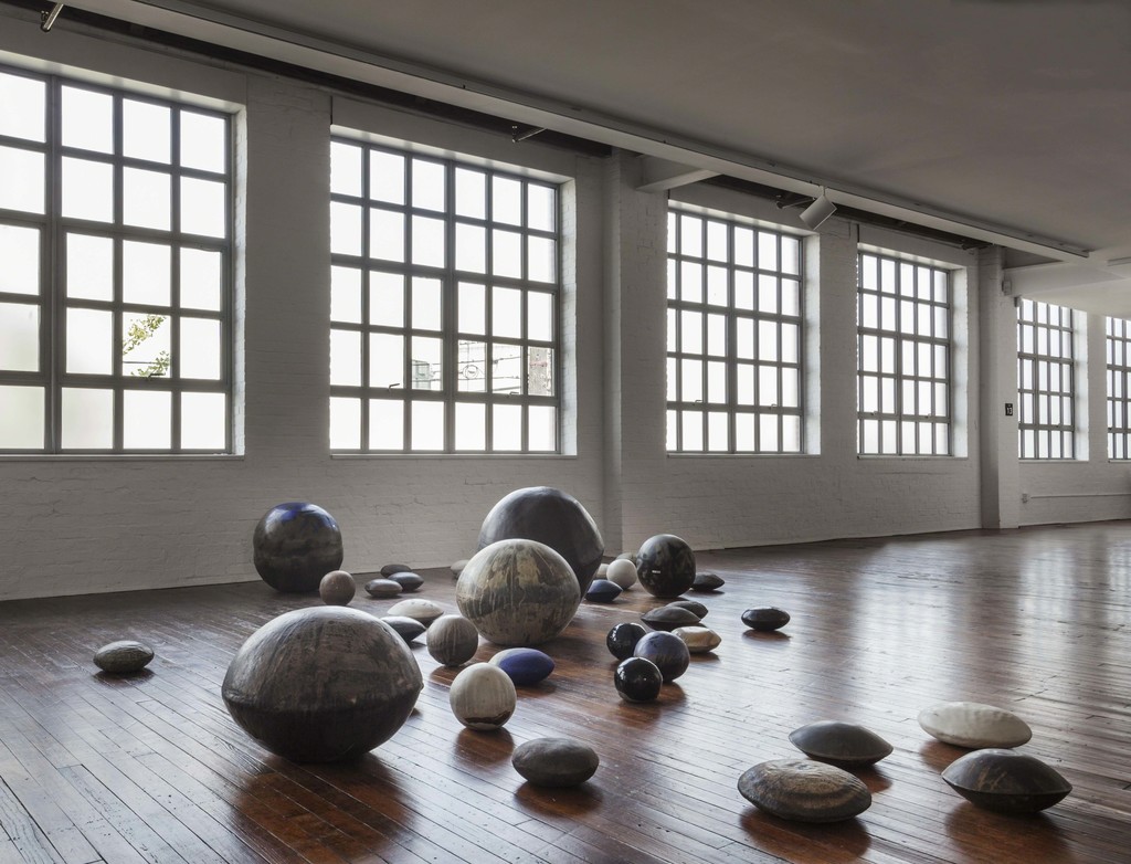 Toshiko Takaezu, “Dry Riverbed”, c. 1980. 41 "River Rocks" and "Moons:" ceramic, glazes; variable. The Takaezu Studio, Quakertown, NJ; Courtesy Jeffrey Spahn Gallery Incorporating works from the collection of Peter D. Russo © The Noguchi Museum. Photo: Elizabeth Felicella Toshiko Takaezu, “Dry Riverbed”, c. 1980. 41 "River Rocks" and "Moons:" ceramic, glazes; variable. The Takaezu Studio, Quakertown, NJ; Courtesy Jeffrey Spahn Gallery Incorporating works from the collection of Peter D. Russo © The Noguchi Museum. Photo: Elizabeth Felicella