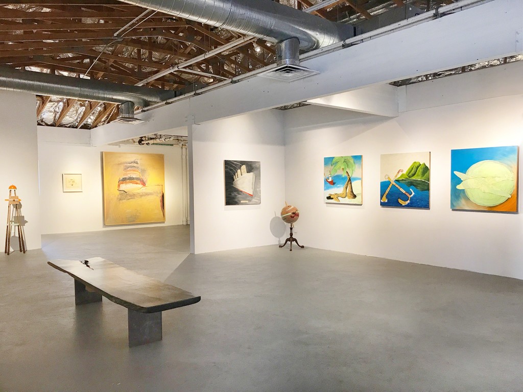 Featured exhibition room works by Doug Britt (left to right): Spirit Level, Summer Vacation, World Wind, Tree Hugger, Floating Anchor, Glo-Ball. Background project room work pictured by Tom Lieber. Featured exhibition room works by Doug Britt (left to right): Spirit Level, Summer Vacation, World Wind, Tree Hugger, Floating Anchor, Glo-Ball. Background project room work pictured by Tom Lieber.