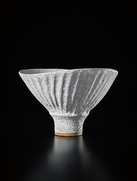 Oval bowl with fluted sides