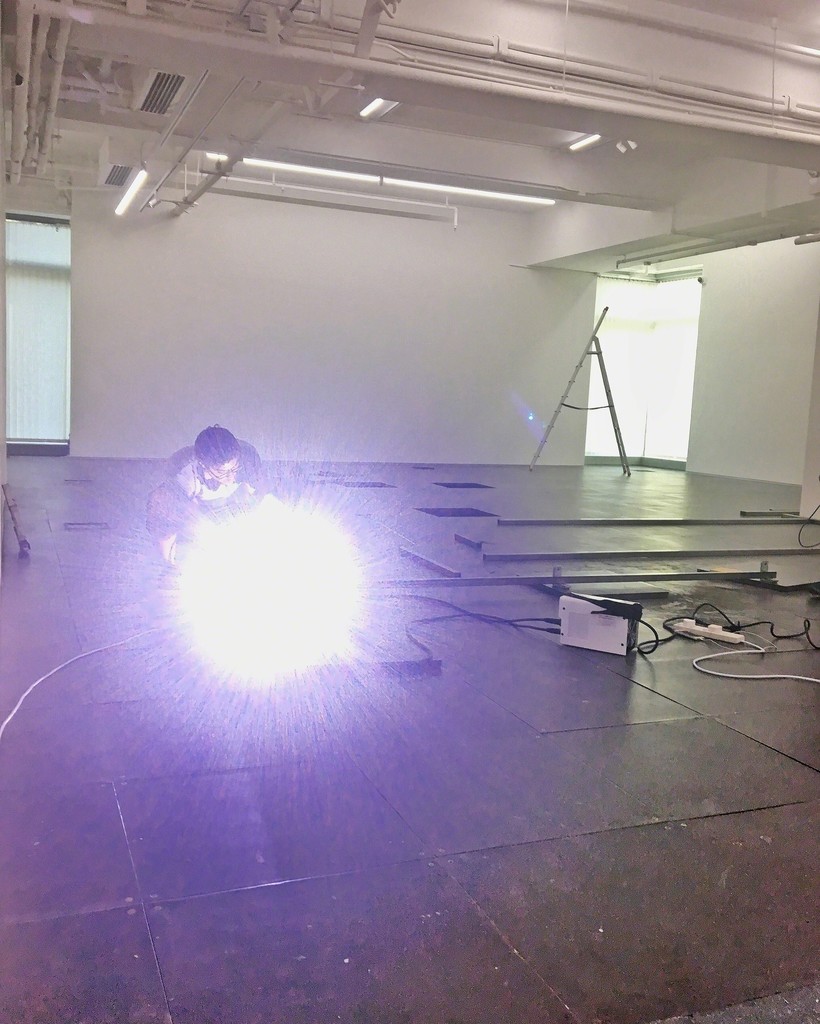 Luk working in the gallery Luk working in the gallery