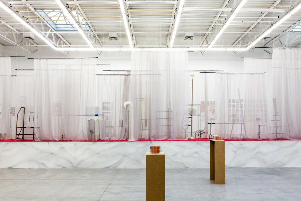 FADE IN: INT. ART GALLERY – DAY, installation view. FADE IN: INT. ART GALLERY – DAY, installation view.