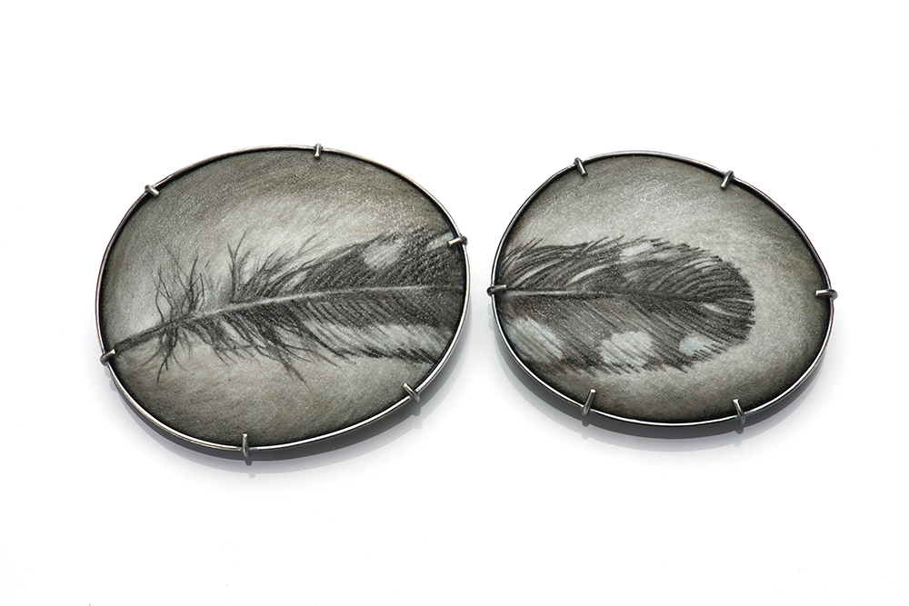 Mi-Sook Hur, "Speckled Feather 1&2," 2017, brooches, enamel on copper, sterling silver, stainless steel pin. Left Brooch: 1 7/8” x 2 3/8” x 1/4”. Right Brooch: 1 5/8” x 2 1/8” x 1/4” Mi-Sook Hur, "Speckled Feather 1&2," 2017, brooches, enamel on copper, sterling silver, stainless steel pin. Left Brooch: 1 7/8” x 2 3/8” x 1/4”. Right Brooch: 1 5/8” x 2 1/8” x 1/4”