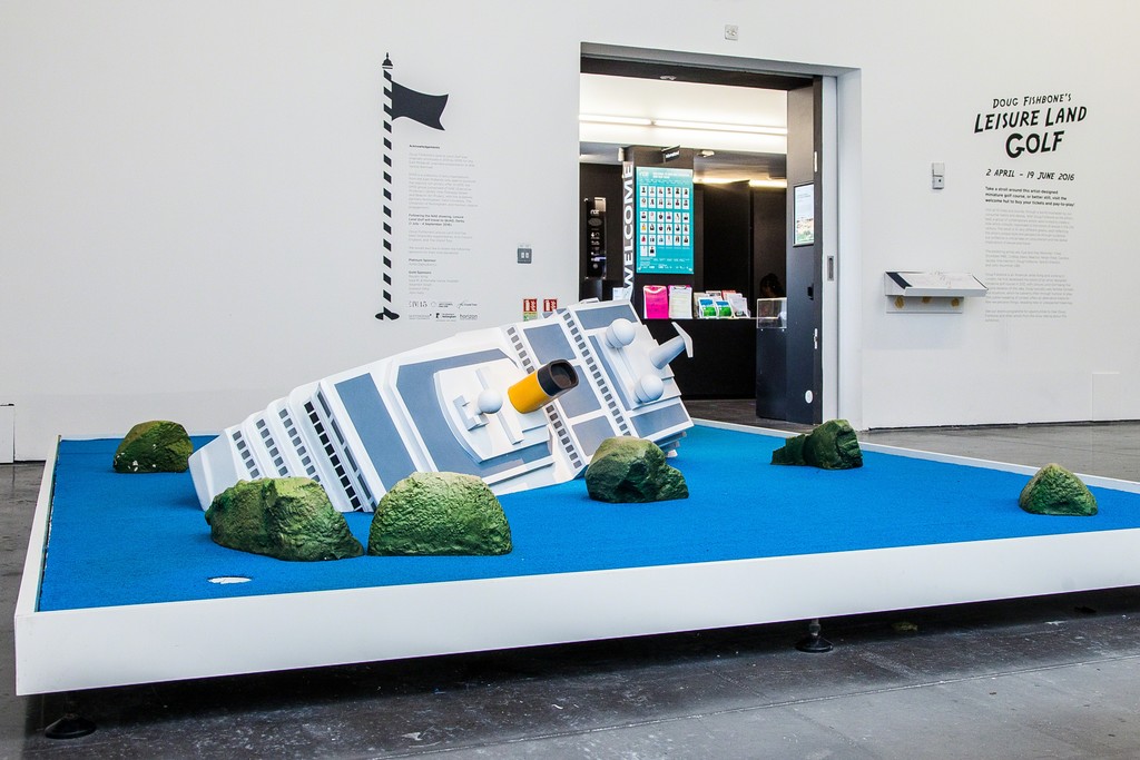 Installation view of "Doug Fishbone's Leisure Land Golf" at New Art Exchange, Nottingham (2016) Photo by Bartosz Kali Installation view of "Doug Fishbone's Leisure Land Golf" at New Art Exchange, Nottingham (2016) Photo by Bartosz Kali
