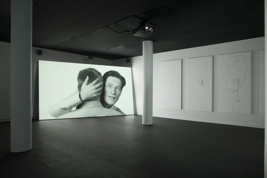 Installation shot of Ed Atkins' Happy Birthday!!!, 2015. Installation. 16:9 HD proejction with 5.1. surround sound, two silent 16:9 films, 10 paintings on board with six perspex text panels. Photo from the exhibition 'Fire under Snow: New film and video works at Louisiana', 27.1.-8.5.2016, Louisiana Museum of Modern Art. Installation shot of Ed Atkins' Happy Birthday!!!, 2015. Installation. 16:9 HD proejction with 5.1. surround sound, two silent 16:9 films, 10 paintings on board with six perspex text panels. Photo from the exhibition 'Fire under Snow: New film and video works at Louisiana', 27.1.-8.5.2016, Louisiana Museum of Modern Art.