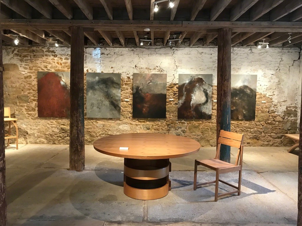 Petter Southall's Three and Two Half Rings Table and Bauhaus Chair with five Brian Graham paintings on the walls. Petter Southall's Three and Two Half Rings Table and Bauhaus Chair with five Brian Graham paintings on the walls.