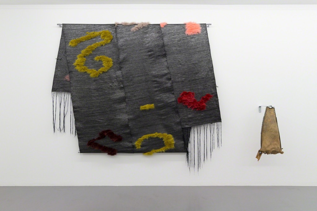 Tysk våg III, Weave of VHS tapes from deutsche welle film archive, fur, metal, 190x230x10 cm
Tunnare hinna, Parchment of cow skin, (residual product in the production of leather), metal objects, textiles and wood, 70x35x45 cm
Tysk våg III, Weave of VHS tapes from deutsche welle film archive, fur, metal, 190x230x10 cm
Tunnare hinna, Parchment of cow skin, (residual product in the production of leather), metal objects, textiles and wood, 70x35x45 cm