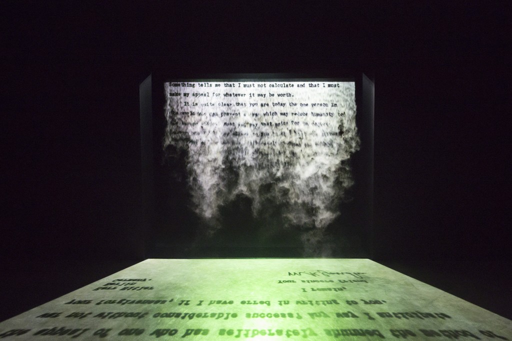 Jitish Kallat, Covering Letter, 2012, installation view, Telling Tales: Excursions in Narrative Form, Museum of Contemporary Art Australia, 2016, fog screen projection, dimensions variable, edition 1/3, Burger Collection, Hong Kong, image courtesy the artist and Museum of Contemporary Art Australia © the artist, photograph: Jessica Maurer Jitish Kallat, Covering Letter, 2012, installation view, Telling Tales: Excursions in Narrative Form, Museum of Contemporary Art Australia, 2016, fog screen projection, dimensions variable, edition 1/3, Burger Collection, Hong Kong, image courtesy the artist and Museum of Contemporary Art Australia © the artist, photograph: Jessica Maurer