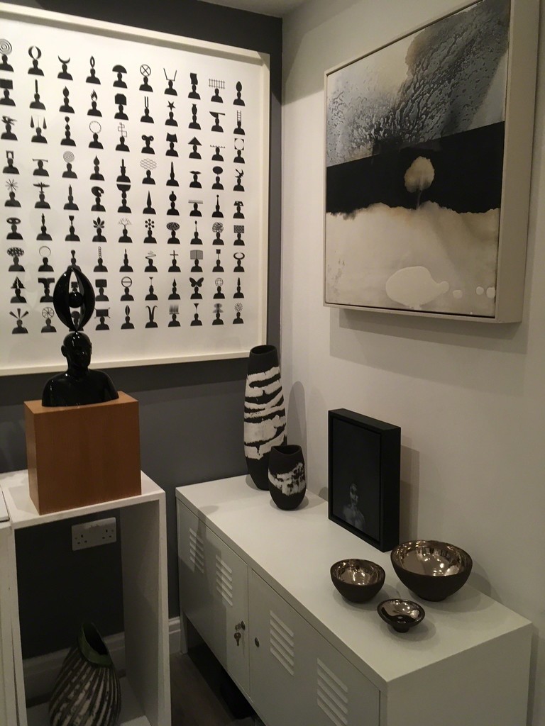 '100 Heads', print and sculpture by Geoff Helyer.
Newlyn Tree by Kerry Harding, ceramics by Kerry Hastings and small painting These Dark Woods | Silence. '100 Heads', print and sculpture by Geoff Helyer.
Newlyn Tree by Kerry Harding, ceramics by Kerry Hastings and small painting These Dark Woods | Silence.