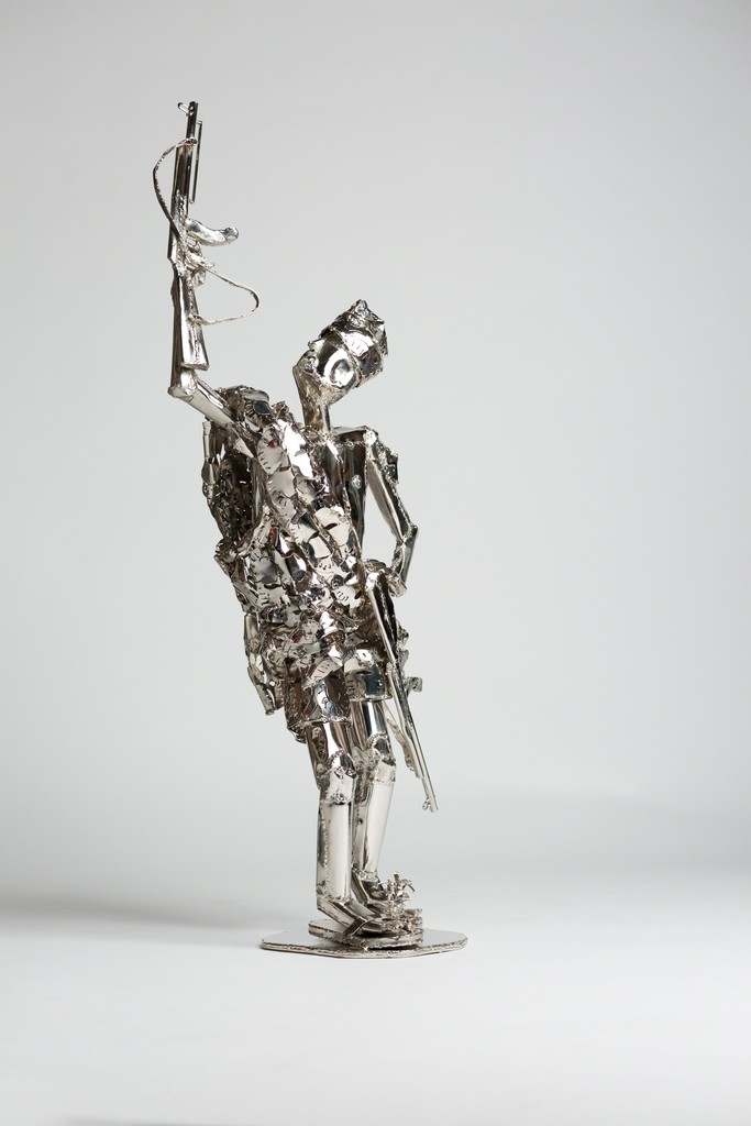 Sokari Douglas Camp, Posing with a Gun, 2015. Nickel plaited steel, 69 x 55 x 39 cm. Photo Jonathan Greet. Courtesy of October Gallery, London. Sokari Douglas Camp, Posing with a Gun, 2015. Nickel plaited steel, 69 x 55 x 39 cm. Photo Jonathan Greet. Courtesy of October Gallery, London.