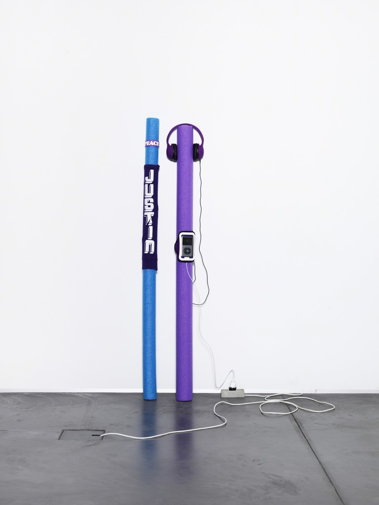 Cory Arcangel, Raw Youth, 2014 / Foam pool noodles, wristband, tailored Bravado Justin Bieber Vertical Hoodie, Skullcandy headphones, Apple iPod classic and charger, Apple iPhone 5 case, Skrillex “Scary Monsters And Nice Sprites” MPEG-1 Audio Layer III file. 140 cm (high), width variable, depth variable
© the artist; Courtesy, Lisson Gallery, London Cory Arcangel, Raw Youth, 2014 / Foam pool noodles, wristband, tailored Bravado Justin Bieber Vertical Hoodie, Skullcandy headphones, Apple iPod classic and charger, Apple iPhone 5 case, Skrillex “Scary Monsters And Nice Sprites” MPEG-1 Audio Layer III file. 140 cm (high), width variable, depth variable
© the artist; Courtesy, Lisson Gallery, London