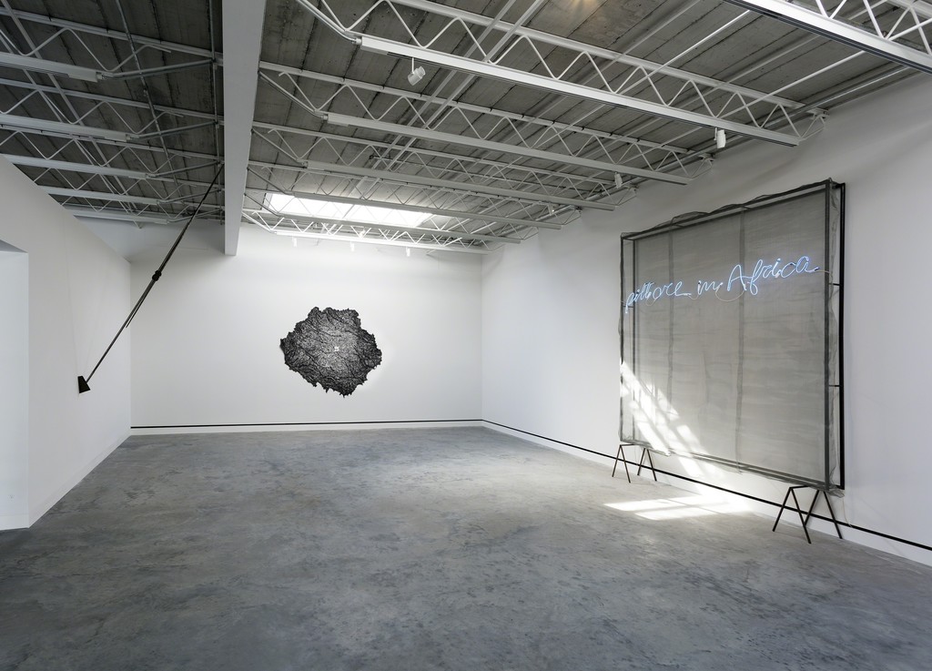Installation view, Arte Povera: From the Olnick Spanu Collection, Magazzino Italian Art. Gilberto Zorio, Giavellotti con impugnatura, 1978; Giuseppe Penone, Palpebra, 1989; Mario Merz, Pittore in Africa, 1984. Photograph by Marco Anelli © 2018. Installation view, Arte Povera: From the Olnick Spanu Collection, Magazzino Italian Art. Gilberto Zorio, Giavellotti con impugnatura, 1978; Giuseppe Penone, Palpebra, 1989; Mario Merz, Pittore in Africa, 1984. Photograph by Marco Anelli © 2018.
