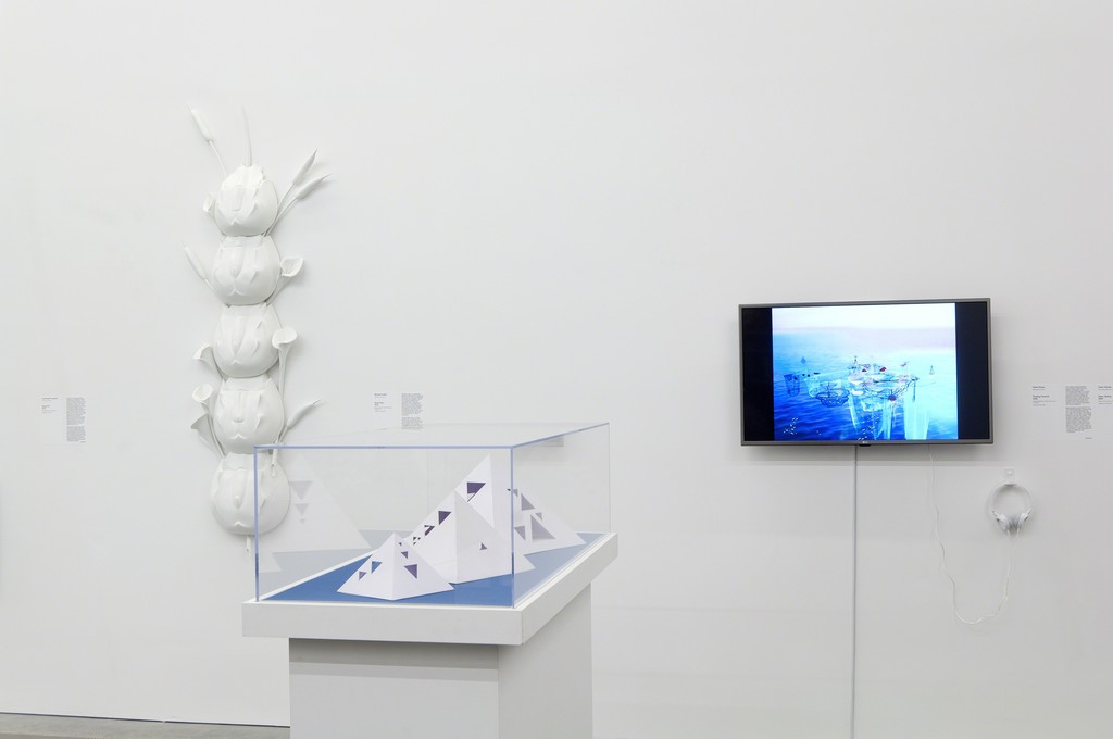(L to R) Installation view of Michael Combs’s "Daisy Chain" (2016) and Pedro Reyes’s "Floating Pyramid" (2014) project models and video as part of special exhibition "Radical Seafaring" on view at the Parrish Art Museum, Water Mill, New York, May 8 – July 24, 2016. Photo: Gary Mamay (L to R) Installation view of Michael Combs’s "Daisy Chain" (2016) and Pedro Reyes’s "Floating Pyramid" (2014) project models and video as part of special exhibition "Radical Seafaring" on view at the Parrish Art Museum, Water Mill, New York, May 8 – July 24, 2016. Photo: Gary Mamay