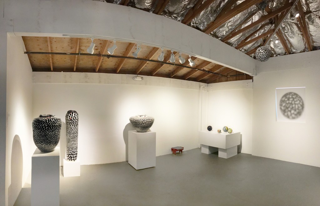 Project room pictured works (left to right) by David Kuraoka; B & W Momona Kalalau Series, PTT B & W With Red, SF Momona, Black and White Tide Pool Ball with Red Meridian, Tropical Stripe Large Ball, Tropical Stripe Mango with Red Stem, Coco 2. Kinetic Light Installation by Chris Atkinson. Project room pictured works (left to right) by David Kuraoka; B & W Momona Kalalau Series, PTT B & W With Red, SF Momona, Black and White Tide Pool Ball with Red Meridian, Tropical Stripe Large Ball, Tropical Stripe Mango with Red Stem, Coco 2. Kinetic Light Installation by Chris Atkinson.