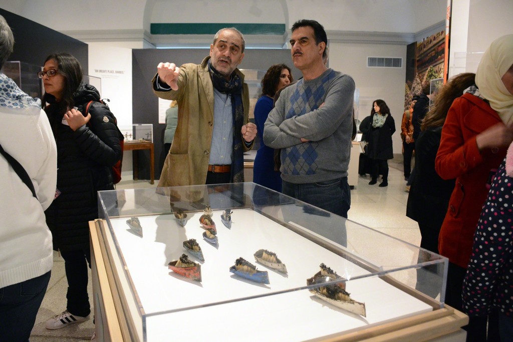 Syrian artist Issam Kourbaj speaks with a visitor about his “art intervention” in the Penn Museum’s new exhibition, "Cultures in the Crossfire: Stories from Syria and Iraq."
Syrian artist Issam Kourbaj speaks with a visitor about his “art intervention” in the Penn Museum’s new exhibition, "Cultures in the Crossfire: Stories from Syria and Iraq."