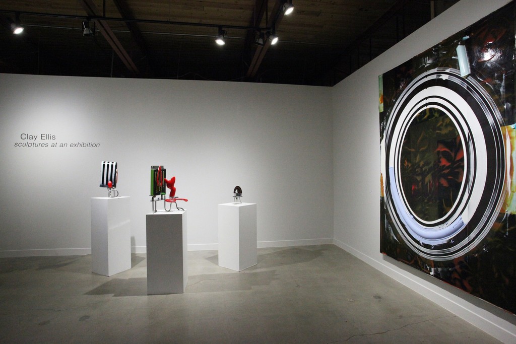 Sculptures shown: 'Sweet Adder, 'Fish Harp', and 'Groove' . Stainless steel, acrylic, aluminum, urethane. Painting shown 'Loose Dally' Acrylic and canvas
Sculptures shown: 'Sweet Adder, 'Fish Harp', and 'Groove' . Stainless steel, acrylic, aluminum, urethane. Painting shown 'Loose Dally' Acrylic and canvas