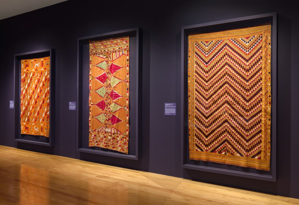 Installation Photograph of "Phulkari: The Embroidered Textiles of Punjab from the Jill and Sheldon Bonovitz Collection" Courtesy of the Philadelphia Museum of Art. Installation Photograph of "Phulkari: The Embroidered Textiles of Punjab from the Jill and Sheldon Bonovitz Collection" Courtesy of the Philadelphia Museum of Art.