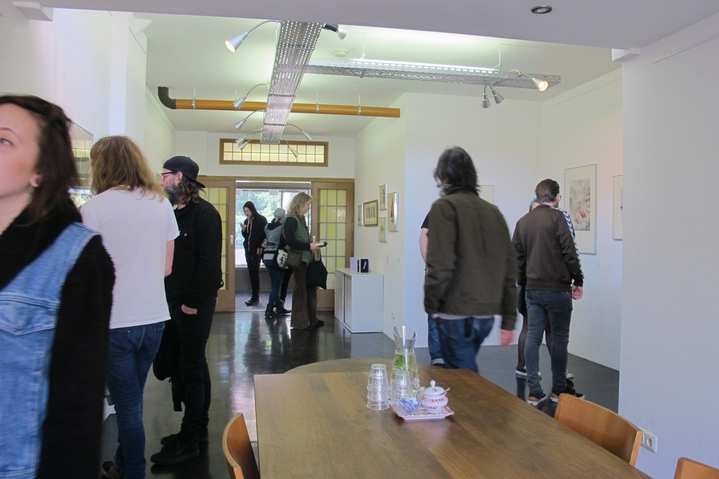 Visitors during Roadburn Festival for the solo exhibition 'Brilliant Shadows' by Arik Roper. Visitors during Roadburn Festival for the solo exhibition 'Brilliant Shadows' by Arik Roper.