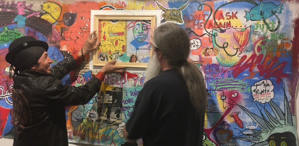 One of the sheep showing an art lover and patron the final composition of their one-of-a-kind piece! One of the sheep showing an art lover and patron the final composition of their one-of-a-kind piece!