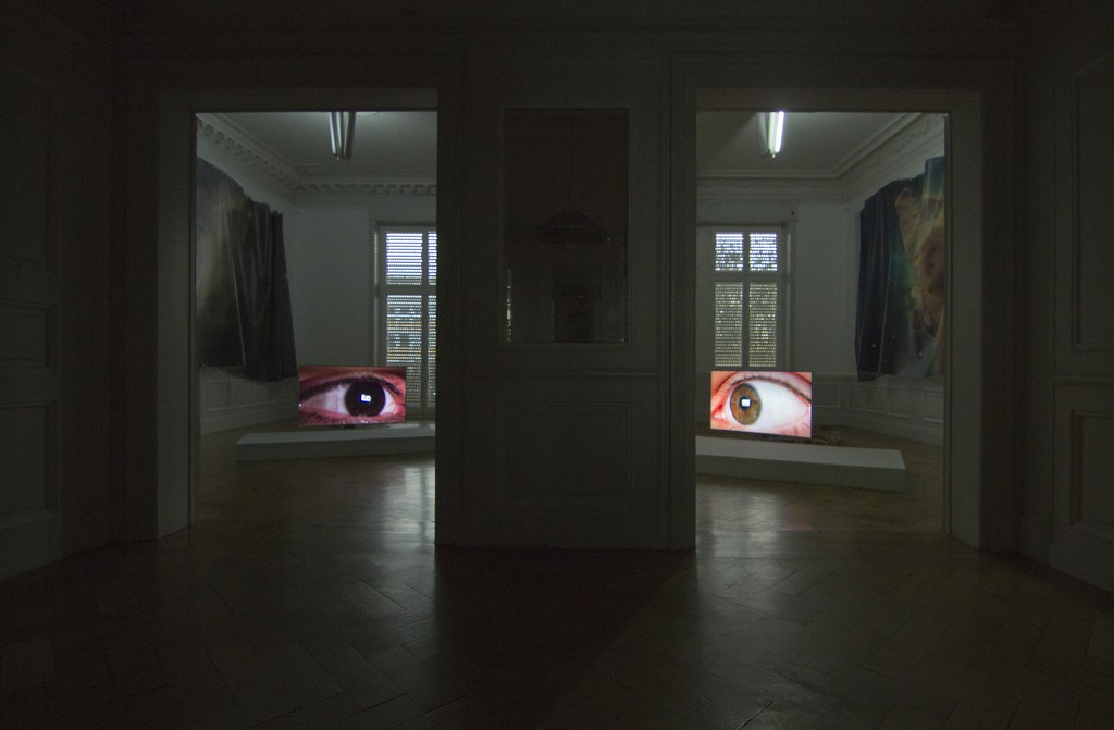 Installation View (from left to right):
Countdown Belladonna, Nebula I (N90), digital print on mesh, size variable, 2016 Countdown Belladonna, Florian, 4k single channel video, 1:22h, 2016
Countdown Belladonna, Anna, 4k single channel video, 1:22h, 2016
Countdown Belladonna, Nebula II (Carina Nebula), digital print on mesh, size variable, 2016 Installation View (from left to right):
Countdown Belladonna, Nebula I (N90), digital print on mesh, size variable, 2016 Countdown Belladonna, Florian, 4k single channel video, 1:22h, 2016
Countdown Belladonna, Anna, 4k single channel video, 1:22h, 2016
Countdown Belladonna, Nebula II (Carina Nebula), digital print on mesh, size variable, 2016