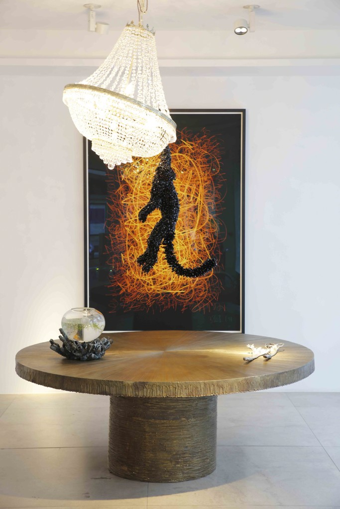 Michele Oka Doner has been creating works in bronze, wood, and natural materials for the last 50 years: her table Radiant is here seen below contemporary artist Barnaby Barford's light sculpture 'Jungle VIP' which he first created in 2014 for a special exhibition at the gallery entitled 'Chandeliers.' Michele Oka Doner has been creating works in bronze, wood, and natural materials for the last 50 years: her table Radiant is here seen below contemporary artist Barnaby Barford's light sculpture 'Jungle VIP' which he first created in 2014 for a special exhibition at the gallery entitled 'Chandeliers.'