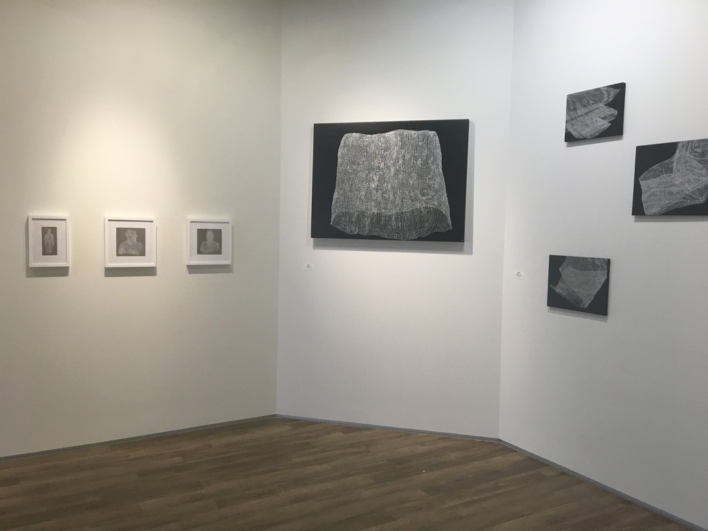 Works by Sarah McCoubrey on left; right: silver ink drawings on black painted canvas by Caroline Burton. Works by Sarah McCoubrey on left; right: silver ink drawings on black painted canvas by Caroline Burton.