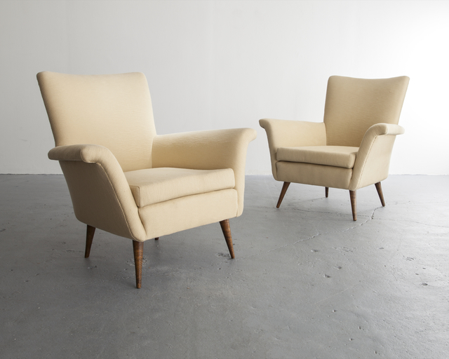 Joaquim Tenreiro, ‘Pair of upholstered lounge chairs with turned hardwood legs. Designed by Joaquim Tenreiro, Brazil, 1950s. (Seat: 16")’, ca. 1950, R & Company