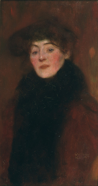 woman in hat and fur collar