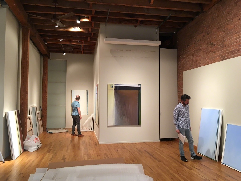 Juan Iribarren and curator Juan Ledezma installing the show at Cecilia de Torres, Ltd. (April 13, 2018) Juan Iribarren and curator Juan Ledezma installing the show at Cecilia de Torres, Ltd. (April 13, 2018)