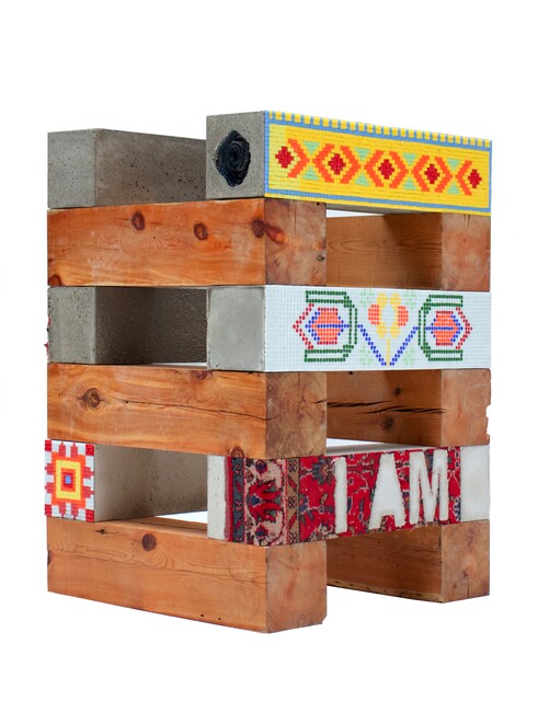The setter of nomad is a greengrocer, the one who builds a house from wood is timber man