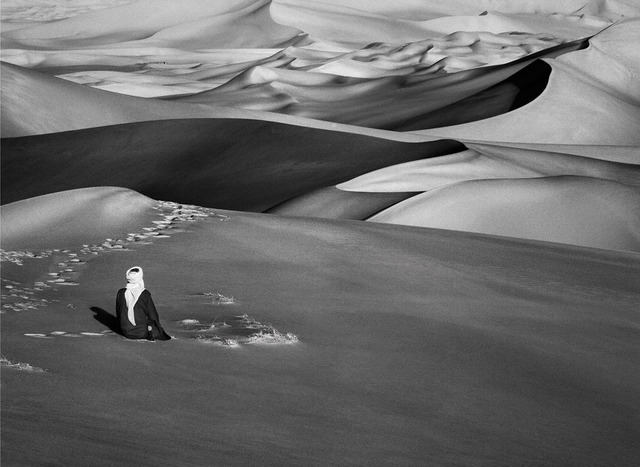 Sebastião Salgado, ‘Man praying in the sand dunes in Maor, Tadrart, South of Djanet, Algeria’, 2009, Photography, Gelatin silver print, Sundaram Tagore Gallery