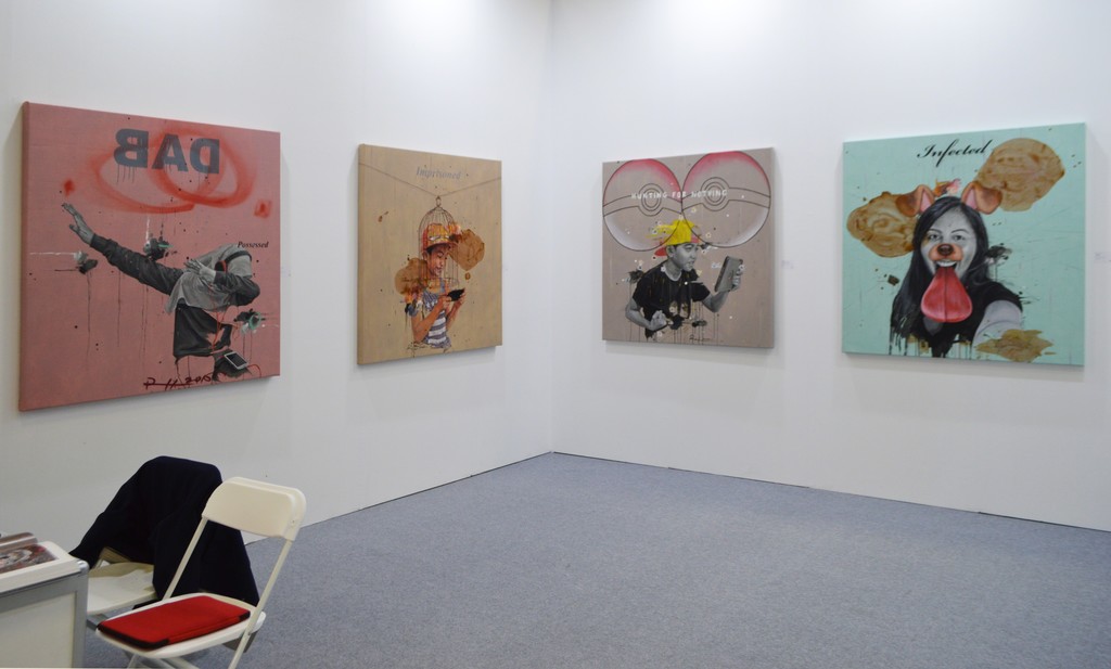 Ruzzeki Harris, Art Taipei 2016: Partial view of the mini solo exhibition display
"Possessed" is a new series of works that delves into the obsession among the younger generation of today with mobile computing and social media. It is a sharp commentary on the part of this emerging Malaysian artist, questioning the value of this obsession, and the effects it might bring Ruzzeki Harris, Art Taipei 2016: Partial view of the mini solo exhibition display
"Possessed" is a new series of works that delves into the obsession among the younger generation of today with mobile computing and social media. It is a sharp commentary on the part of this emerging Malaysian artist, questioning the value of this obsession, and the effects it might bring