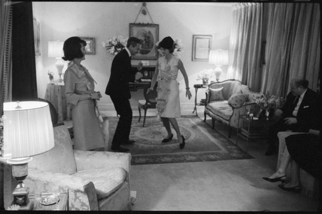 Benno Graziani, ‘At her sister Lee Radziwill's flat in London, Jackie Kennedy learns how to dance the twist with designer Oleg Cassini.’, 1962, Photography, Archival pigment ink on baryta paper., Galerie XII