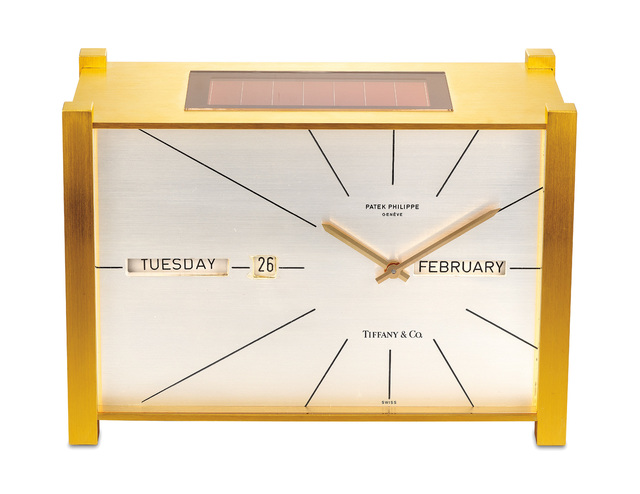 Patek Philippe, ‘An attractive and well preserved gilt brass solar powered perpetual calendar table clock with “straight line” display, retailed by Tiffany & Co.’, 1968, Design/Decorative Art, Phillips