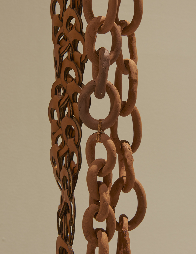 ektor garcia, cadenas perpetuas, 2019, detail, ektor garcia: cadena perpetua, SculptureCenter, New York, 2019. Terra cotta, copper wire, leather, steel ring. Dimensions variable. Courtesy the artist. Photo: Kyle Knodell ektor garcia, cadenas perpetuas, 2019, detail, ektor garcia: cadena perpetua, SculptureCenter, New York, 2019. Terra cotta, copper wire, leather, steel ring. Dimensions variable. Courtesy the artist. Photo: Kyle Knodell