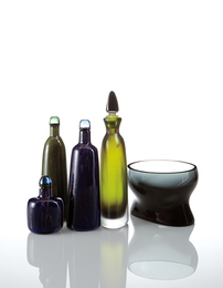 Four decanters and a bowl