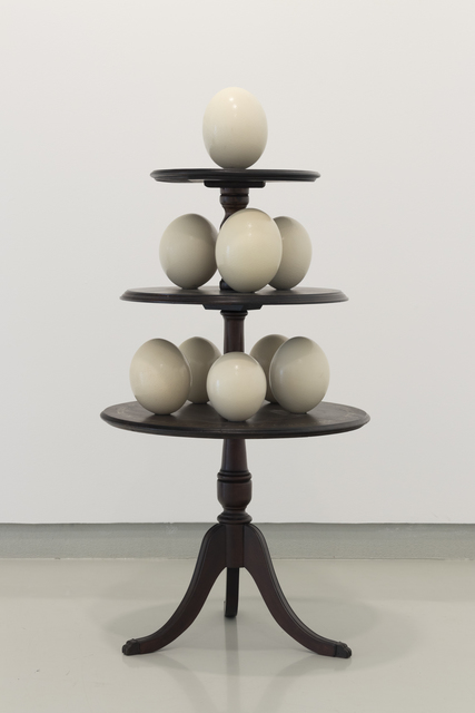 Vasco Araújo, ‘Exotismo – And I am also thinking of tomorrow’, 2019, Sculpture, Wooden table, 9 ostrich eggs and painted text, PRESENÇA